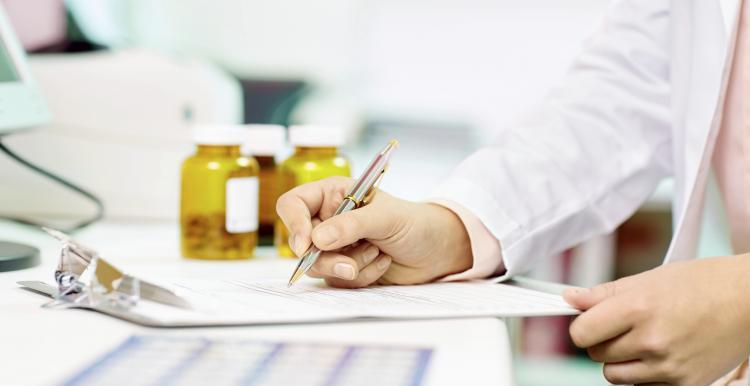 Doctor writing