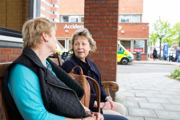 Two women talking at A&E