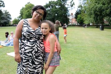 Woman with child in park