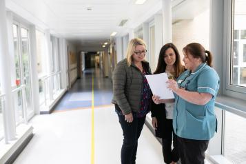 Women and nurse in hospital